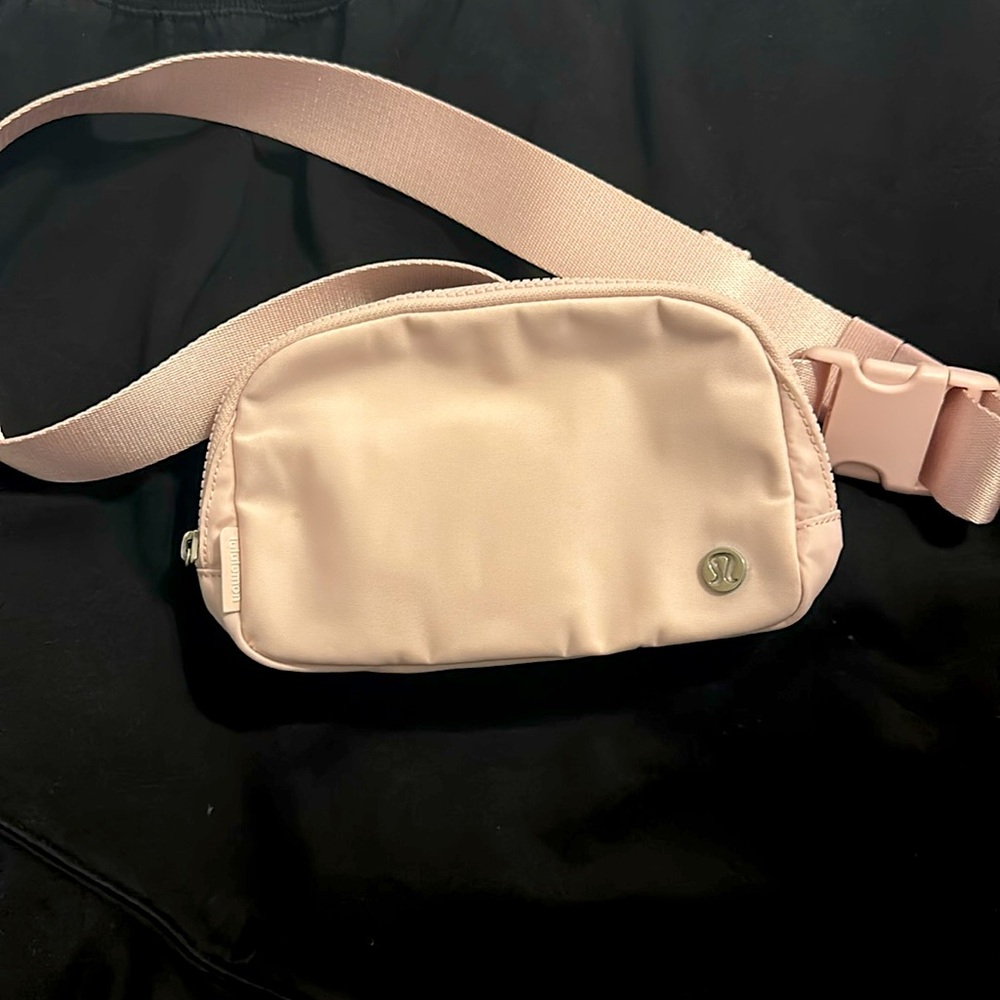 Pink Lululemon belt bag